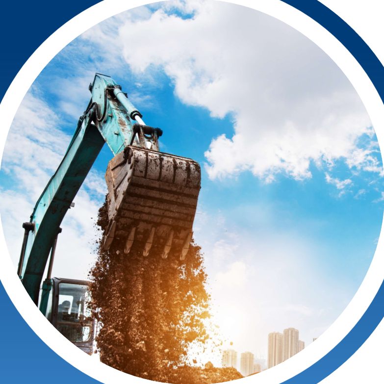 Excavator loading earth against a clear sky